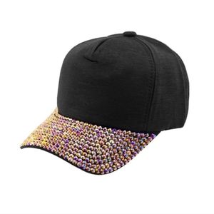 Black baseball cap with bronze rose gold  rhinestones covering the bill visor